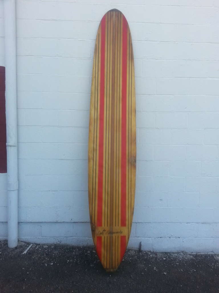 Totally radical much used and old collectible long surfboard from the father of modern surfing, Hawaii based Duke Kahanamoku, 1890--1968
An awesome sculptural and architectural objet d'art (and play)