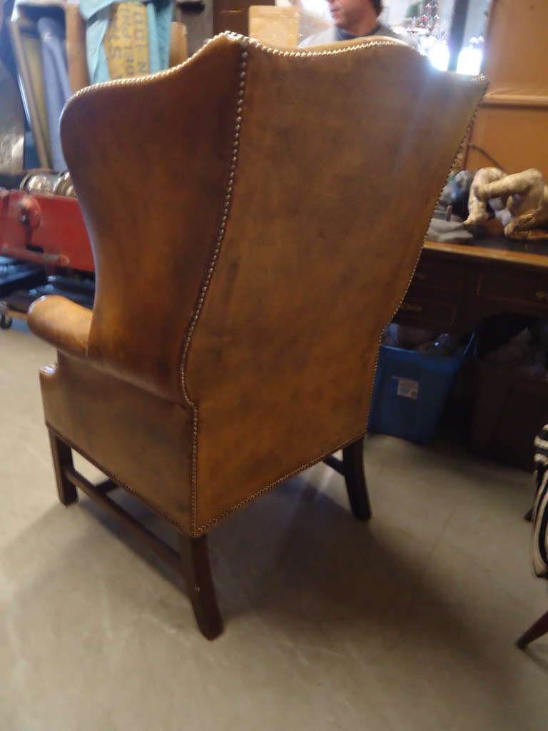 George III Style Old Distressed Leather Tufted Wing Chair In Good Condition In Hopewell, NJ