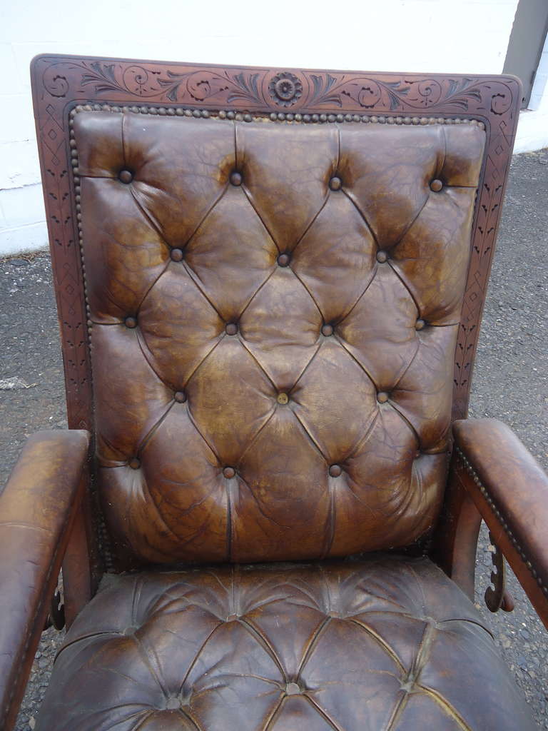 Distressed Irish Mechanical Leather and Carved Wood Reading Chair In Excellent Condition In Hopewell, NJ