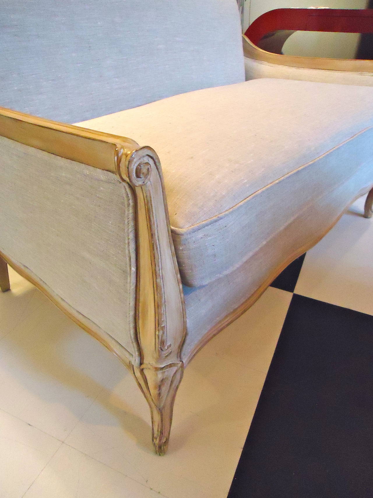 Creamy antiqued carved wood loveseat by Meyer Gunther Martini (no label), newly refurbished in 100% Irish linen fabric.  Neutral and sophisticated.