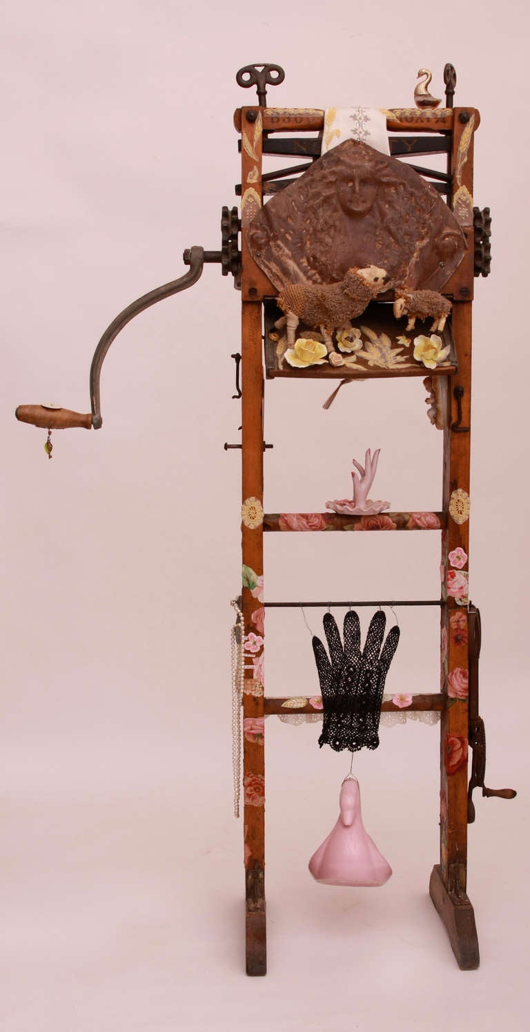 Mixed media assemblage sculpture created on freestanding laundry wringer.
Artist's meditation on motherhood and the loss of her own mother.
Yeat's bittersweet poem, 