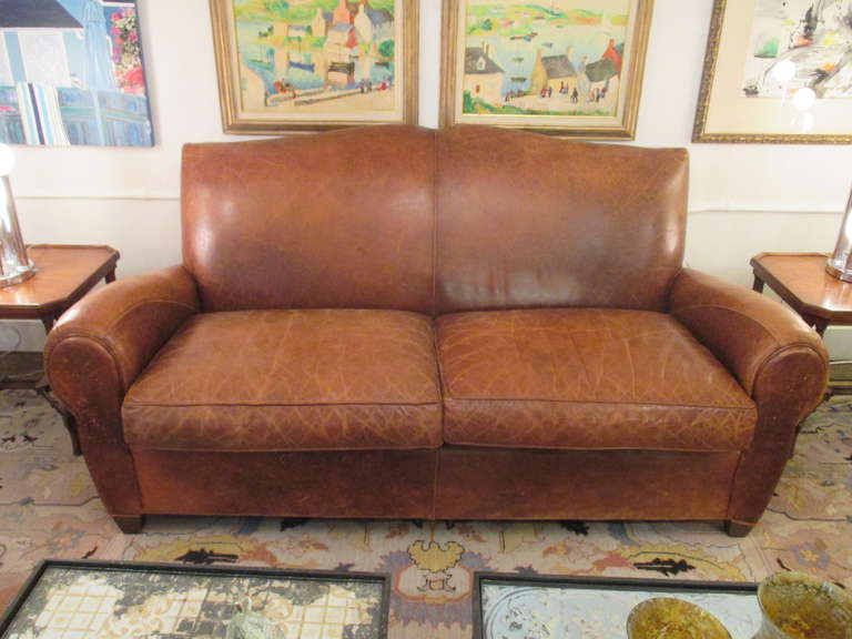 Wonderful supple leather with natural distressing, two seat cushions, great tailored shape.
Seat:
24