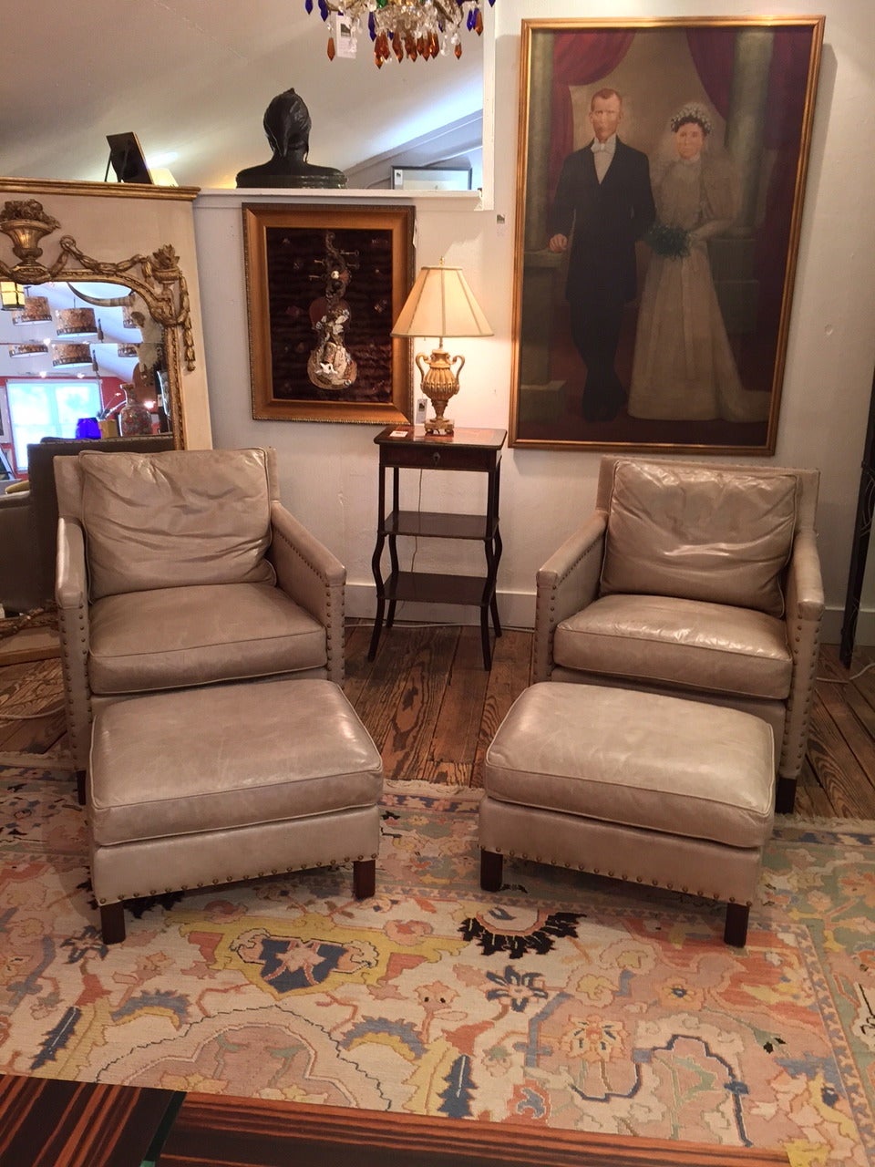 American Pair of Sophisticated Leather Club Chairs and Ottomans