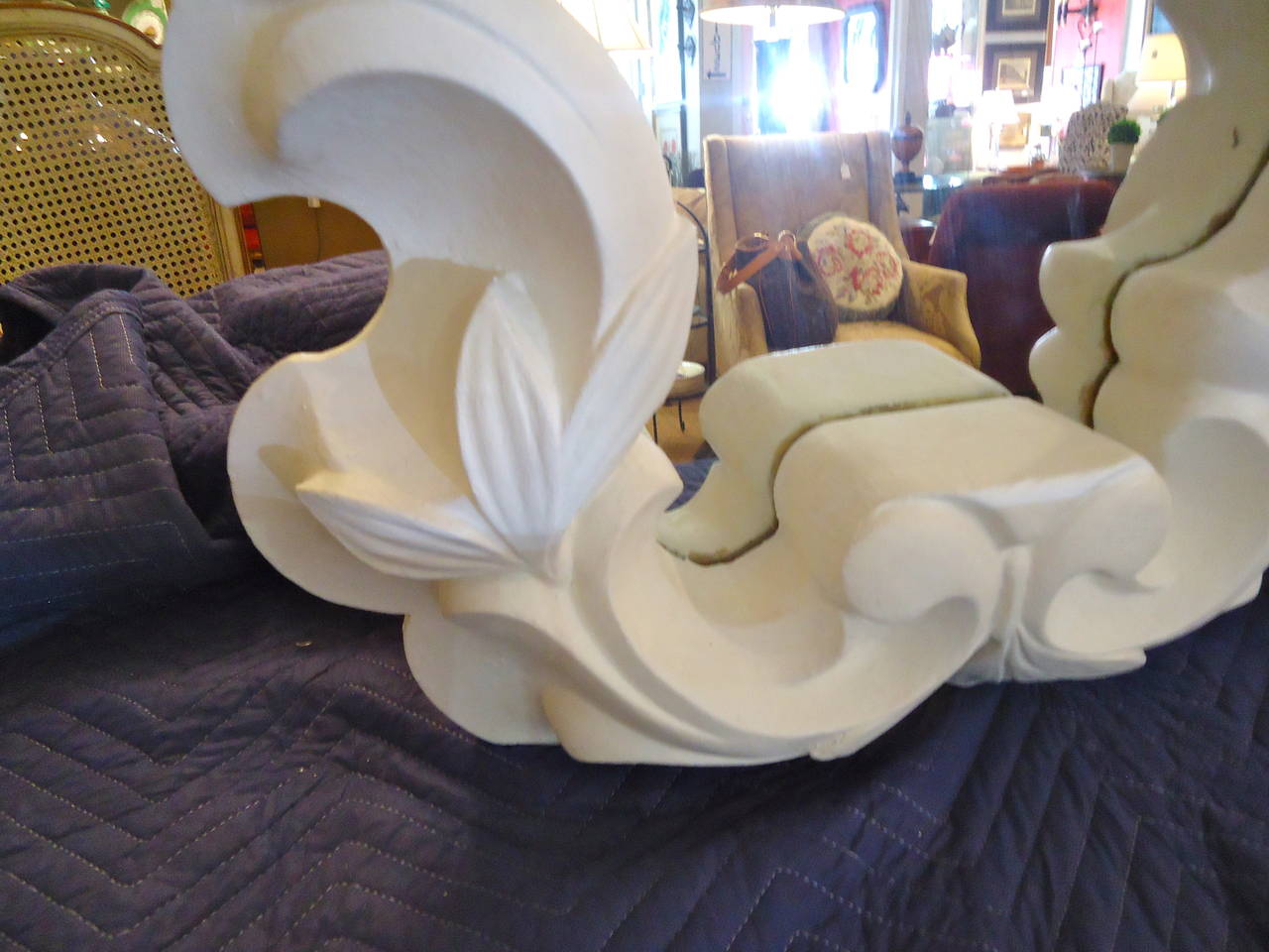 Chunky curvy and sexy in the style and drama of Dorothy Draper, asymmetrical white molded plaster mirror.