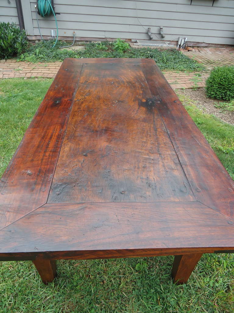 Heavy, gorgeous mahogany in a rustic style, casual elegance.