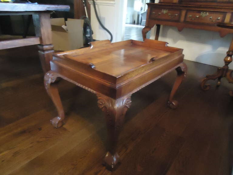 Inlaid mahogany, removeable tray top, lovely carved cabriole legs.  Great smallish size, very versatile.
Tray measures  18.5 x  32