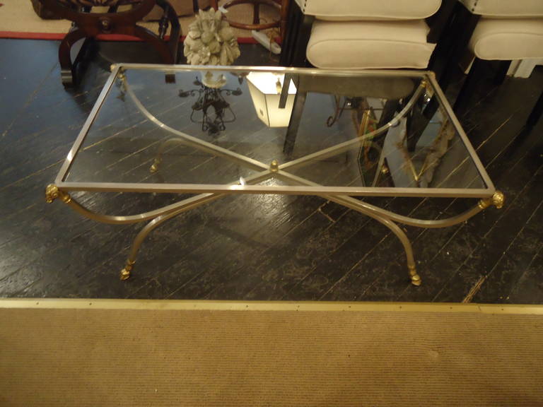 Great medium sized coffee table, steel and brass with rams head adornments and an 