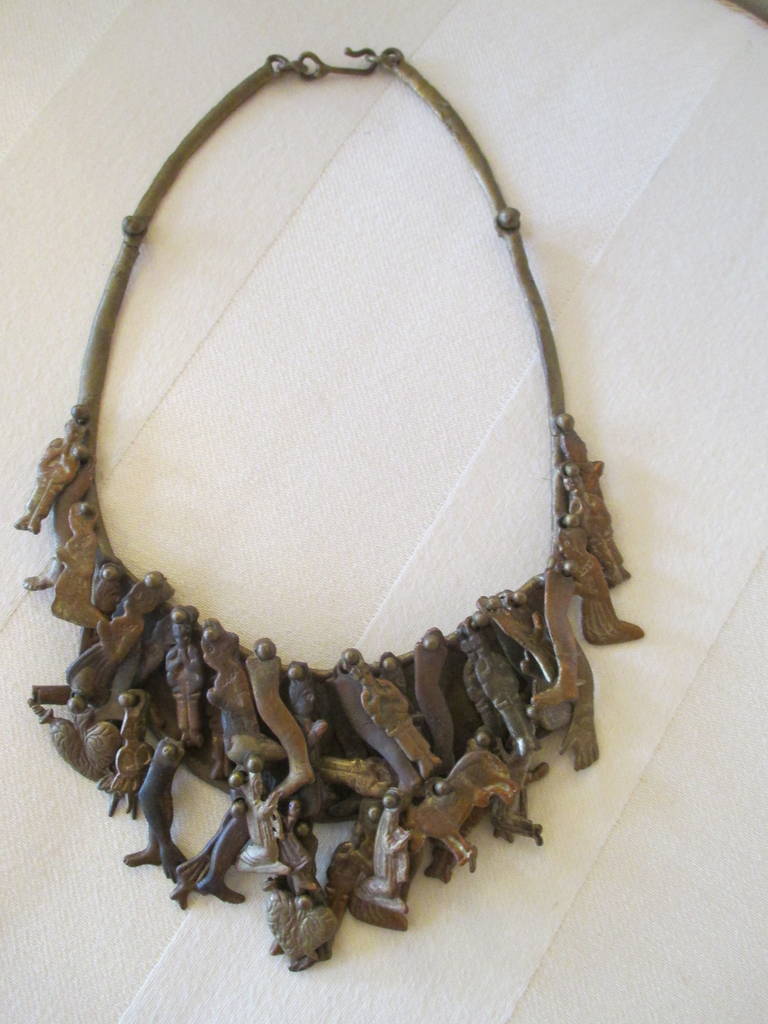 Milagros necklace by sculptor 