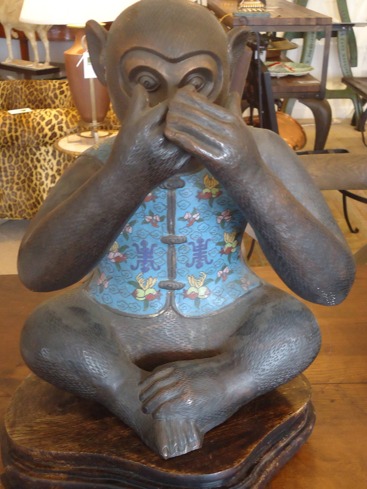 Wonderful trio of bronze monkeys adorned in colorful cloisonne jackets and sitting on vintage wooden bases. Each is gesturing and enacting the age old adage, see no evil, hear no evil, speak no evil.
Measure: Bases are 12 W x 12 D.