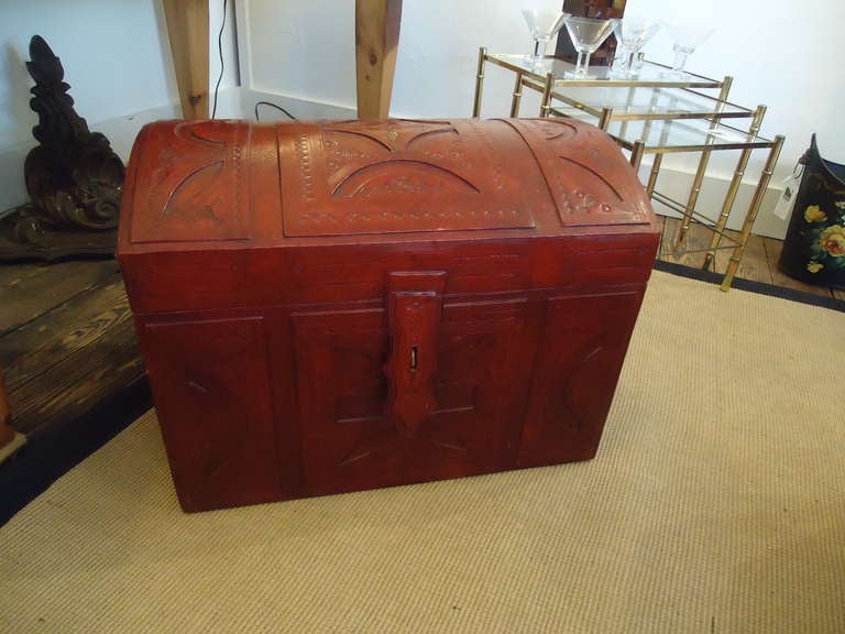 Rich red oxide color, beautiful workmanship and great little trunk for storage and an unexpected warm accessory.
