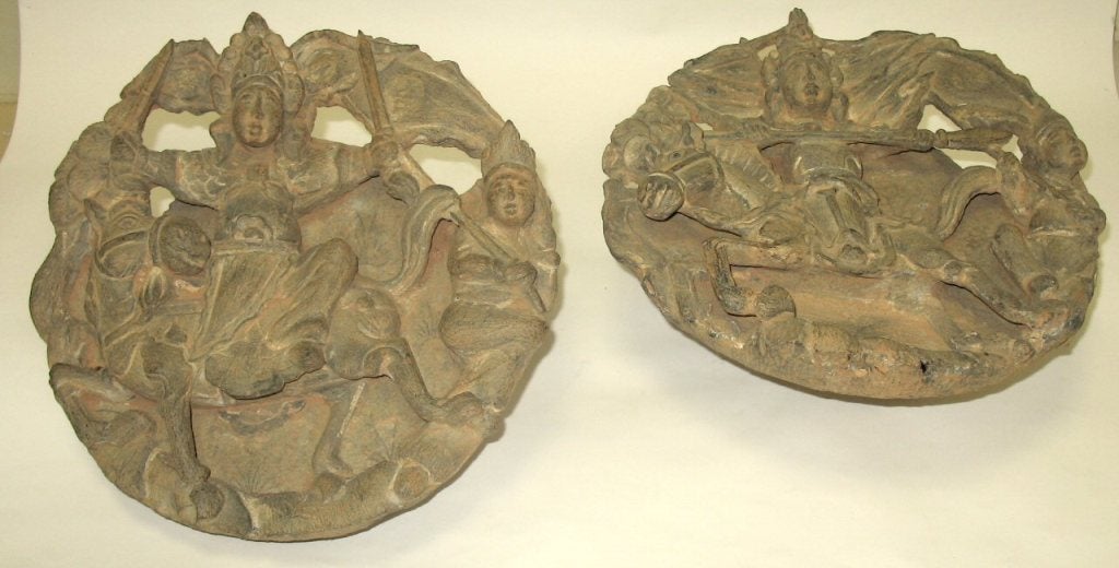 Carved Stone Warrior Medallions