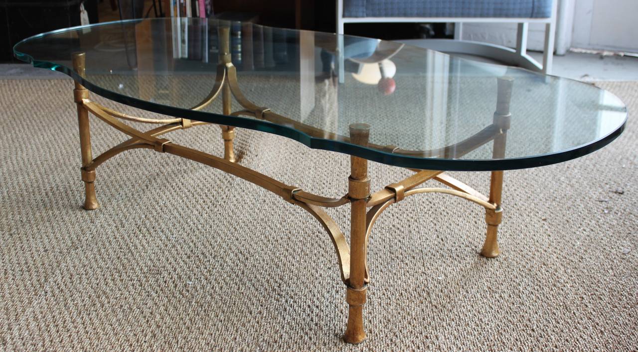 Hollywood Regency Decorator Gilt Wrought Iron Coffee Table with Cut and Rounded Glass