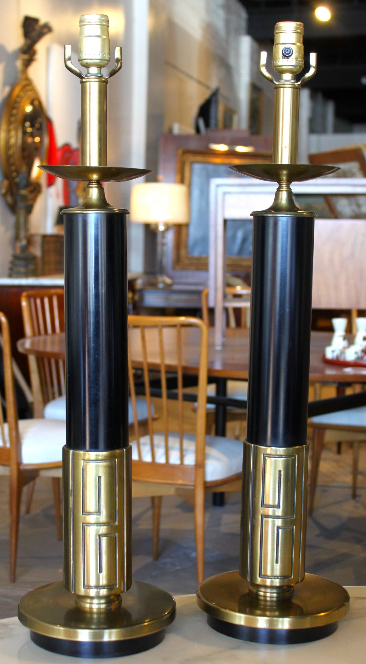 Pair of brass lamps with Greek key motif. Classic design. In the style of Parzinger and James Mont.