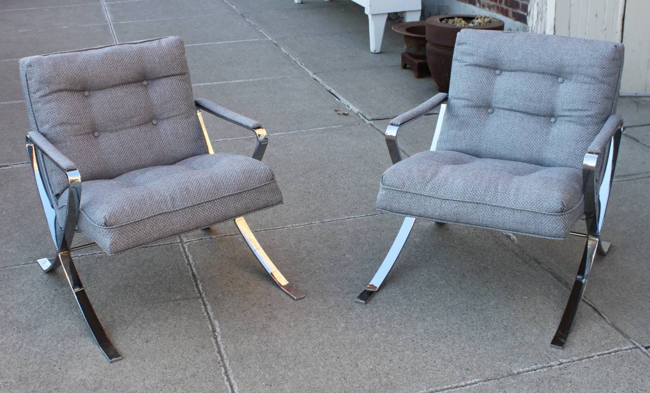 Vintage polished chrome lounge chairs, circa 1970s. Recent upholstery. Milo Baughman style.