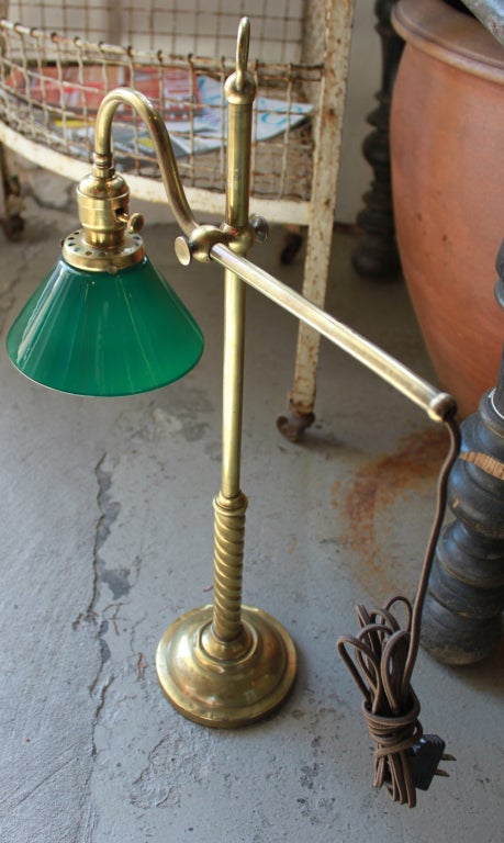 O.C. White Black Telescoping Table Lamp c. 1910.

Brass Swing Arm Adjustable Table Lamp, c. 1900. SOLD

Tall Brass Adjustable Arm Table Lamp, Green Shade, c. 1900. SOLD
Price is for each.