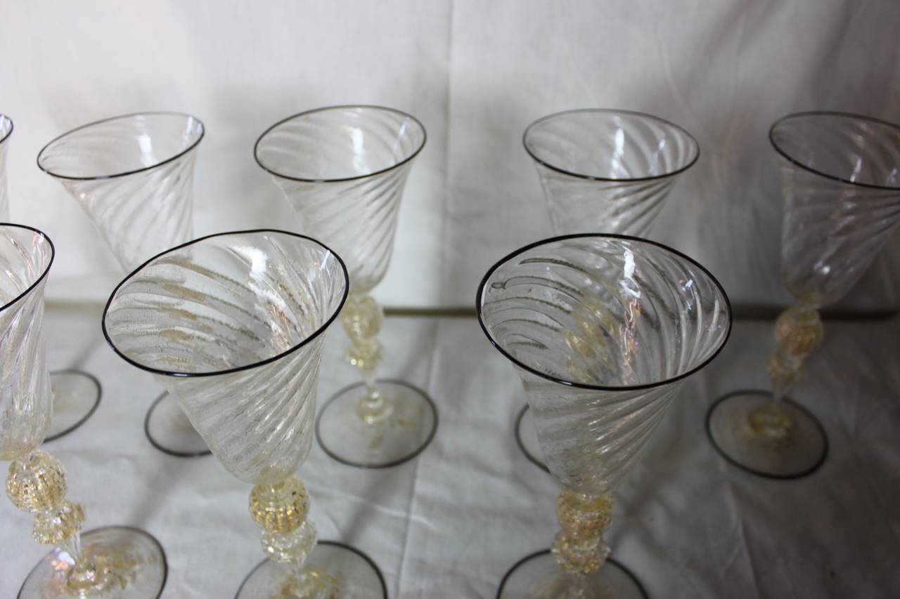 Gorgeous antique large wine glasses. Black rims, gold leaf flakes, swirl pattern. All handmade. In mint condition.