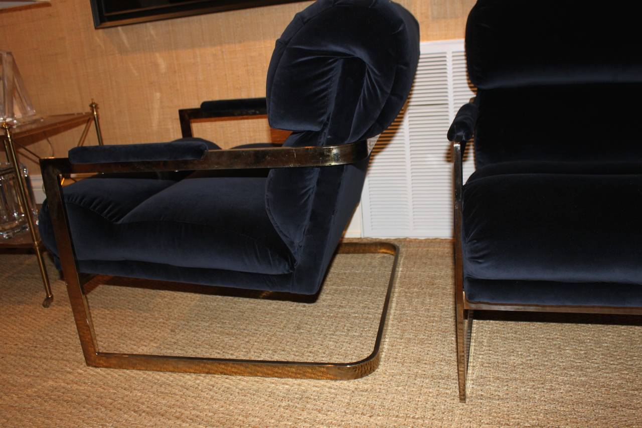 Pair of 1970's gold tone chrome Milo Baughman Lounge Chairs in excellent condition.  Newly reupholstered in Quadrille's Midnight Blue cotton velvet.