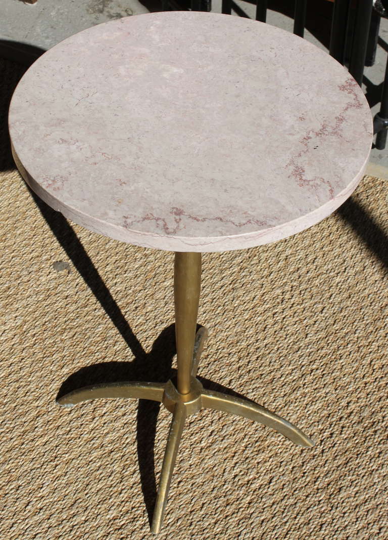 Simple Mid-Century Modern design.  Small chips on marble.  Aged brass metal legs.  Overall in very good vintage condition. Stamped 