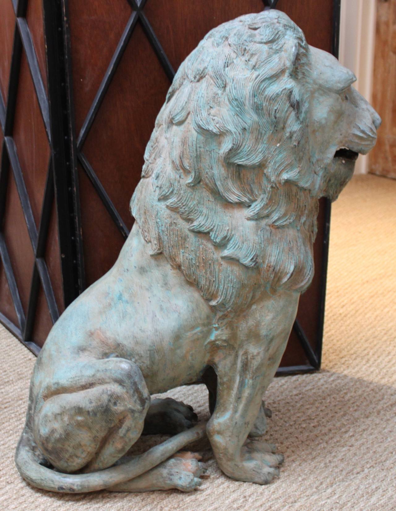 Vintage pair of bronze lions from the collection of Joseph Reed.