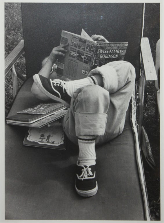 Beautiful black and white photograph by George Zimbel: Matt reading 'Swiss Family Robinson,' 