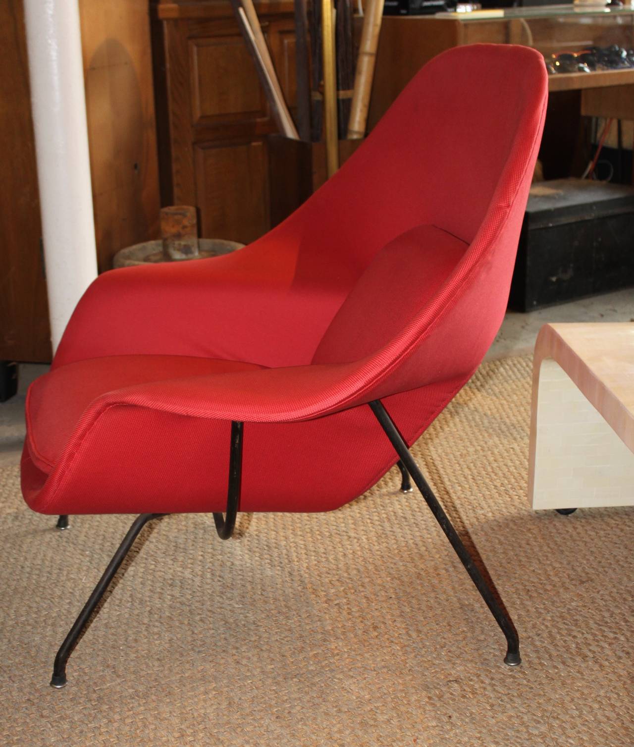 1950s, Saarinen Womb chair with iron legs.
