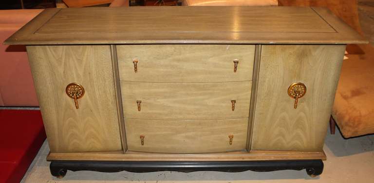 Beautiful Sideboard with strong stylistic elements of James Mont design.  Subtle Asian design details.  Solid and sturdy.  Original hardwares. Gilt ball feet.