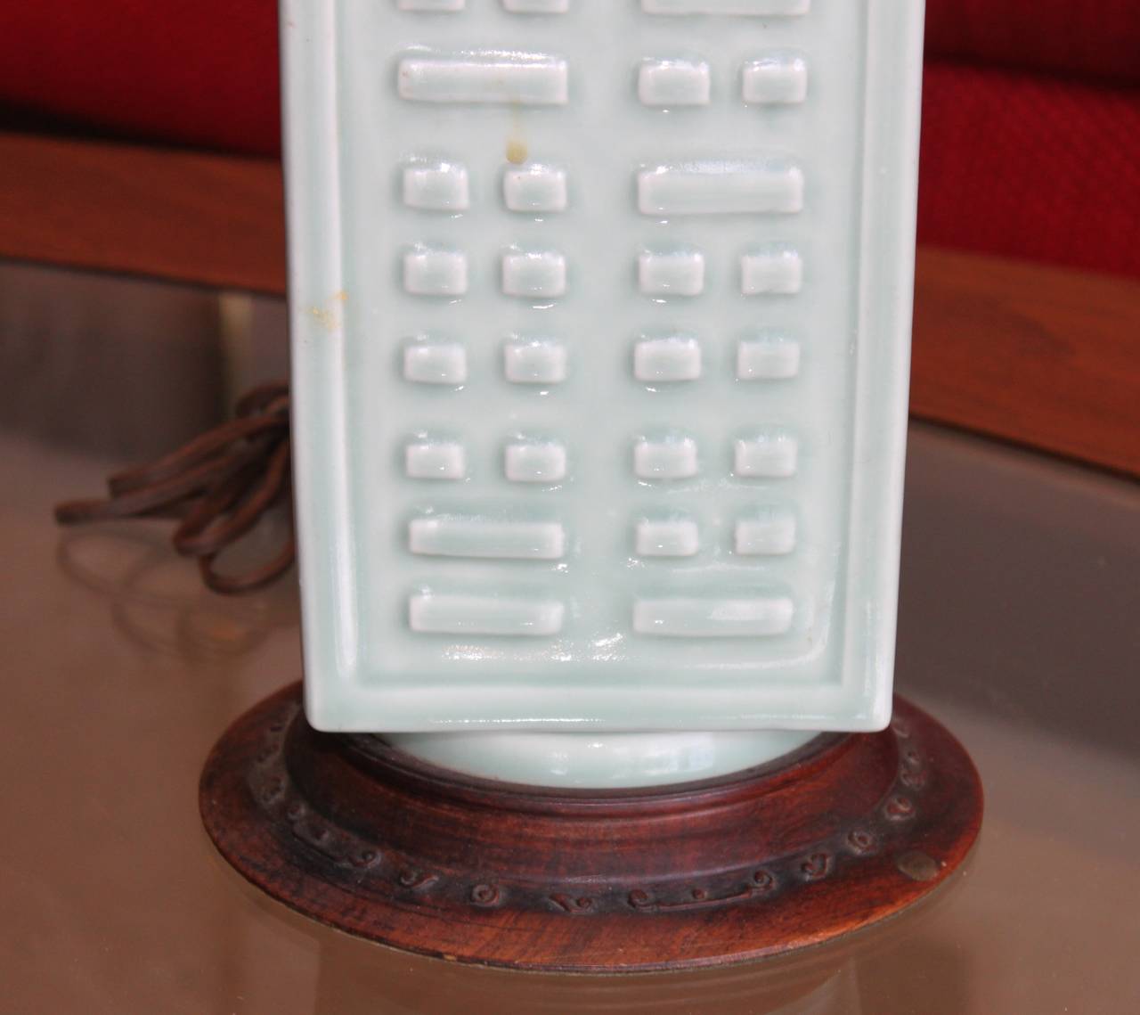 Vintage Celadon Chinese porcelain lamp on carved wood base. In 