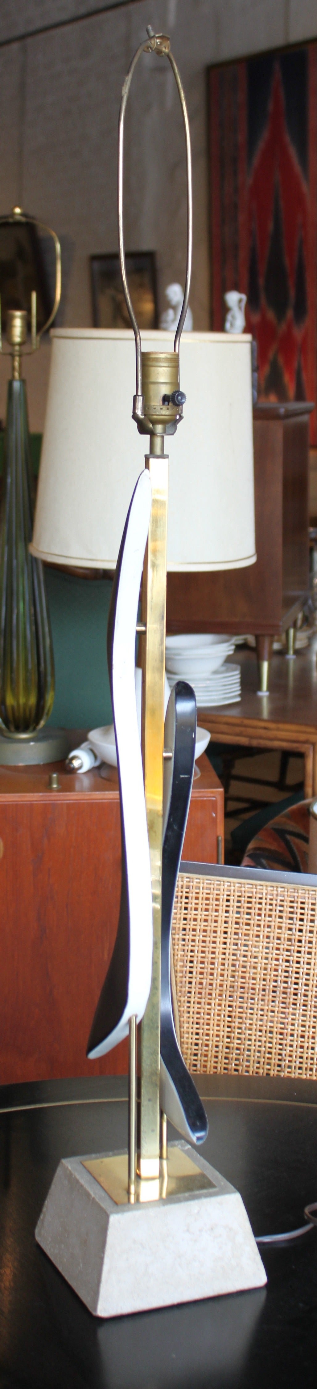 Tommi Parzinger style sculptural lamp on stone base.