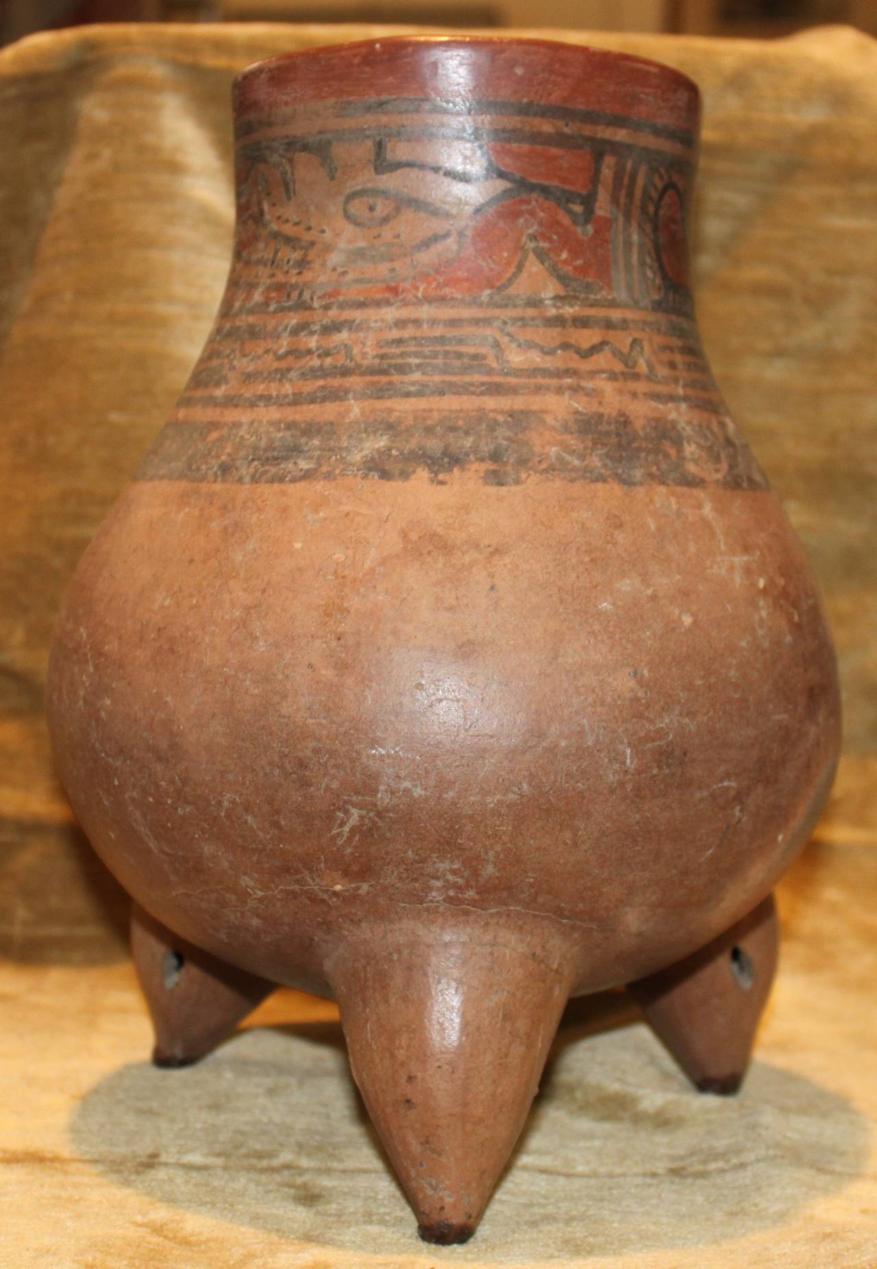 Three legged Pre-Columbian Mesoamerican pot.