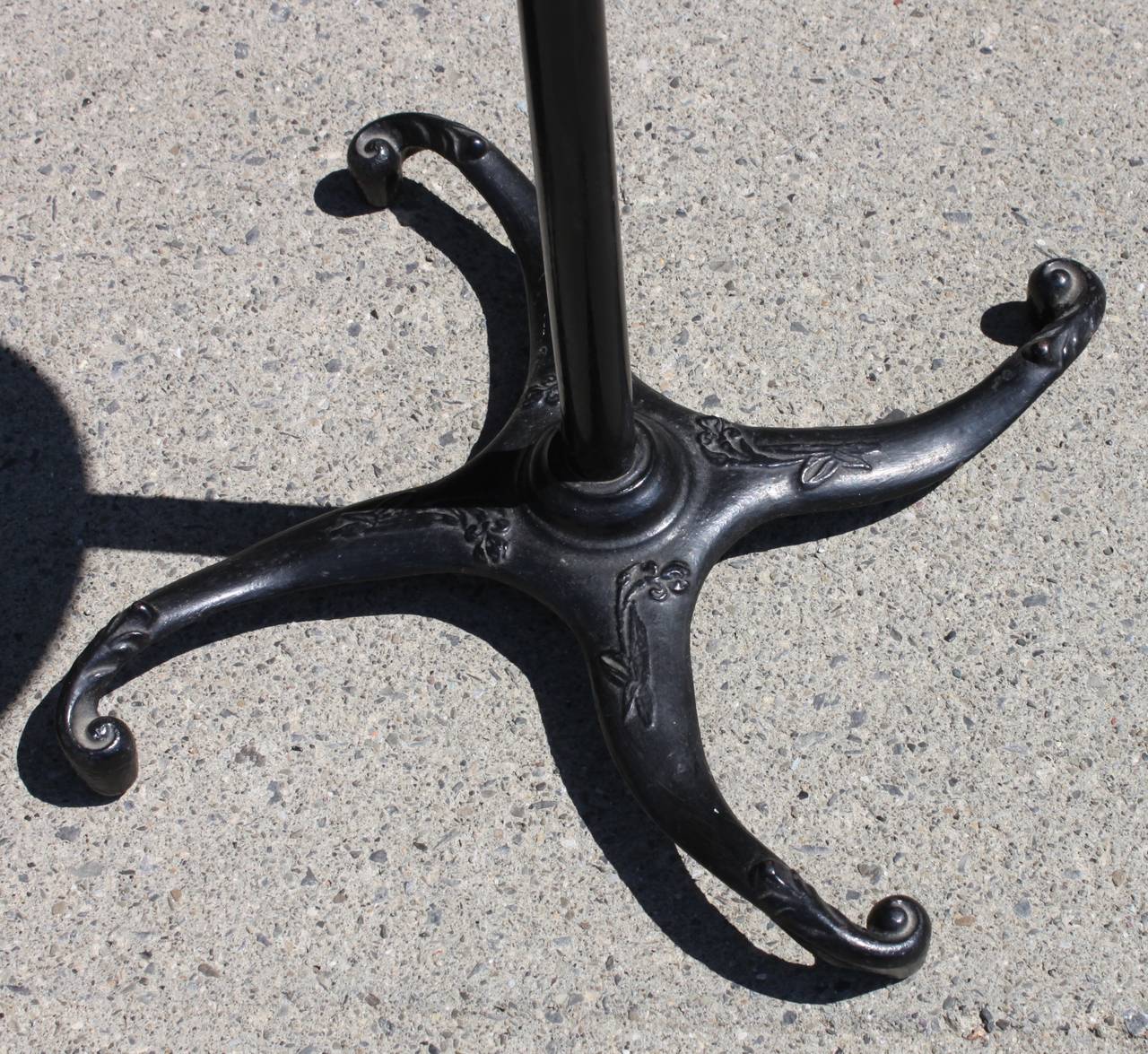 Victorian shaving mirror with beautiful cast iron legs.