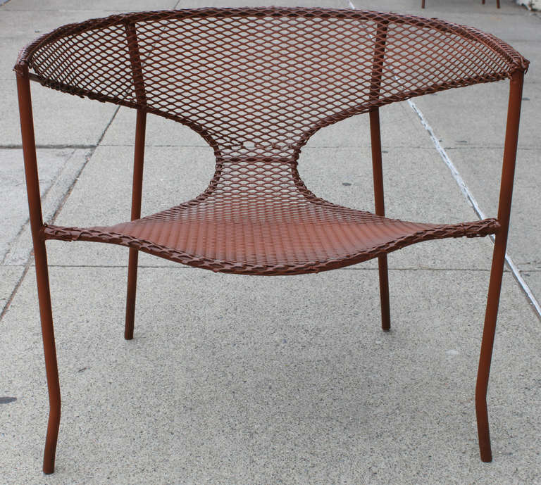 A wonderful set of four steel lounge chairs created by Francis Mair in the early 1950's. this set has been modified from it's original wicker covering to its current steel mesh in the early 1960's. the shape is reminiscent of a klismos style and the