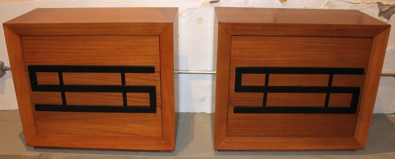 Pair of mahogany three drawer dressers by Karp Furniture with stylized ebonized pulls. Metal tag label.