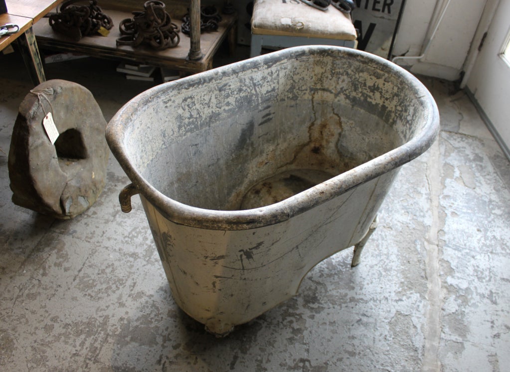 From Stephanie Lloyd, an old bath tub from France with built in seat. 

Note: depth to bottom: 27