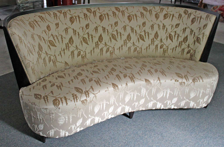 Very elegant Donghia curved setee. Black lacquer wood frame and feet. Cut velvet leaf motif fabric.