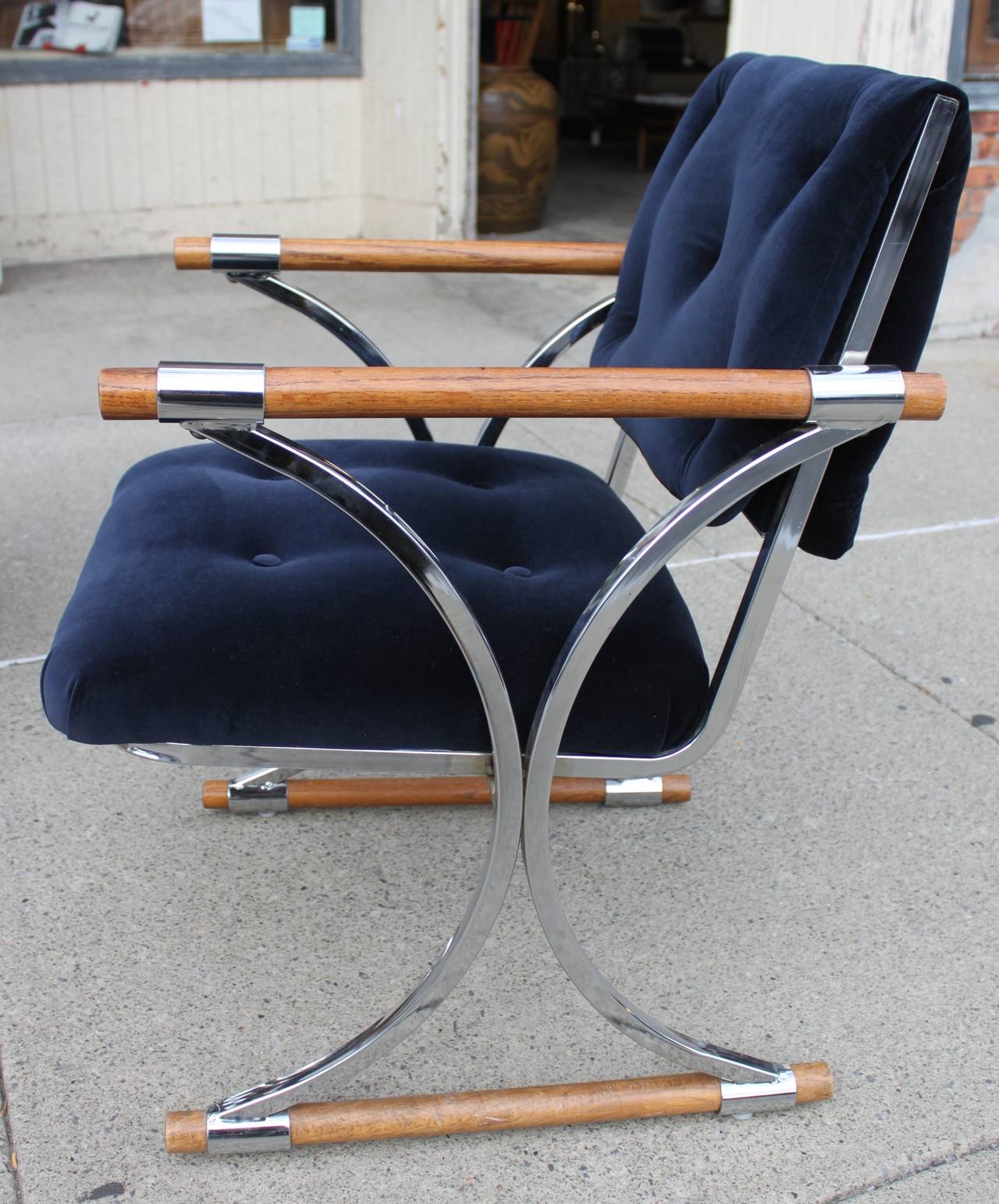 Mid-Century Modern Armchairs Chrome and Walnut in new Quadrille's mid-night blue velvet.