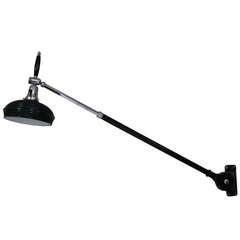 Adjustable Full Motion Machine Age Wall Light