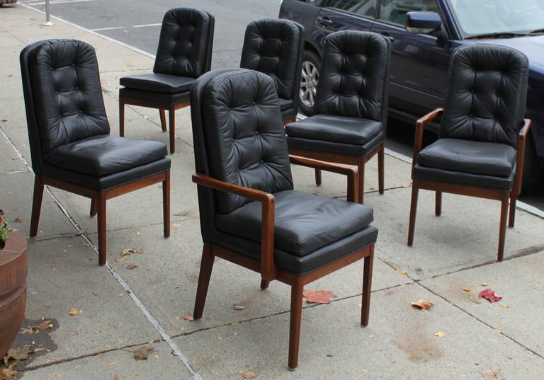 Set of six Milo Baughman style dining chairs. Walnut frame with beautiful leather upholstery.