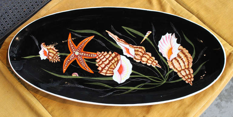 1950's Quimper fish platter by Guy Trevoux. Exquisitely painted in rich glaze depiction of sea creatures. other pieces available.