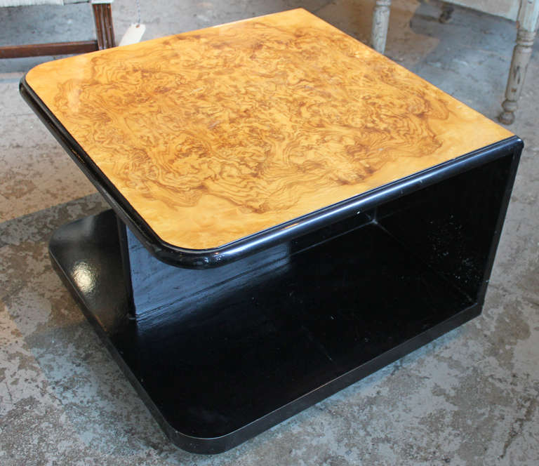 A nice pair of booked matched elm burl veneered topped end tables. Open on three sides with divided shelf and rounded corners, this pair is truly indicative of the modern era. All original finish in very good condition with minor nicks and scuffs.