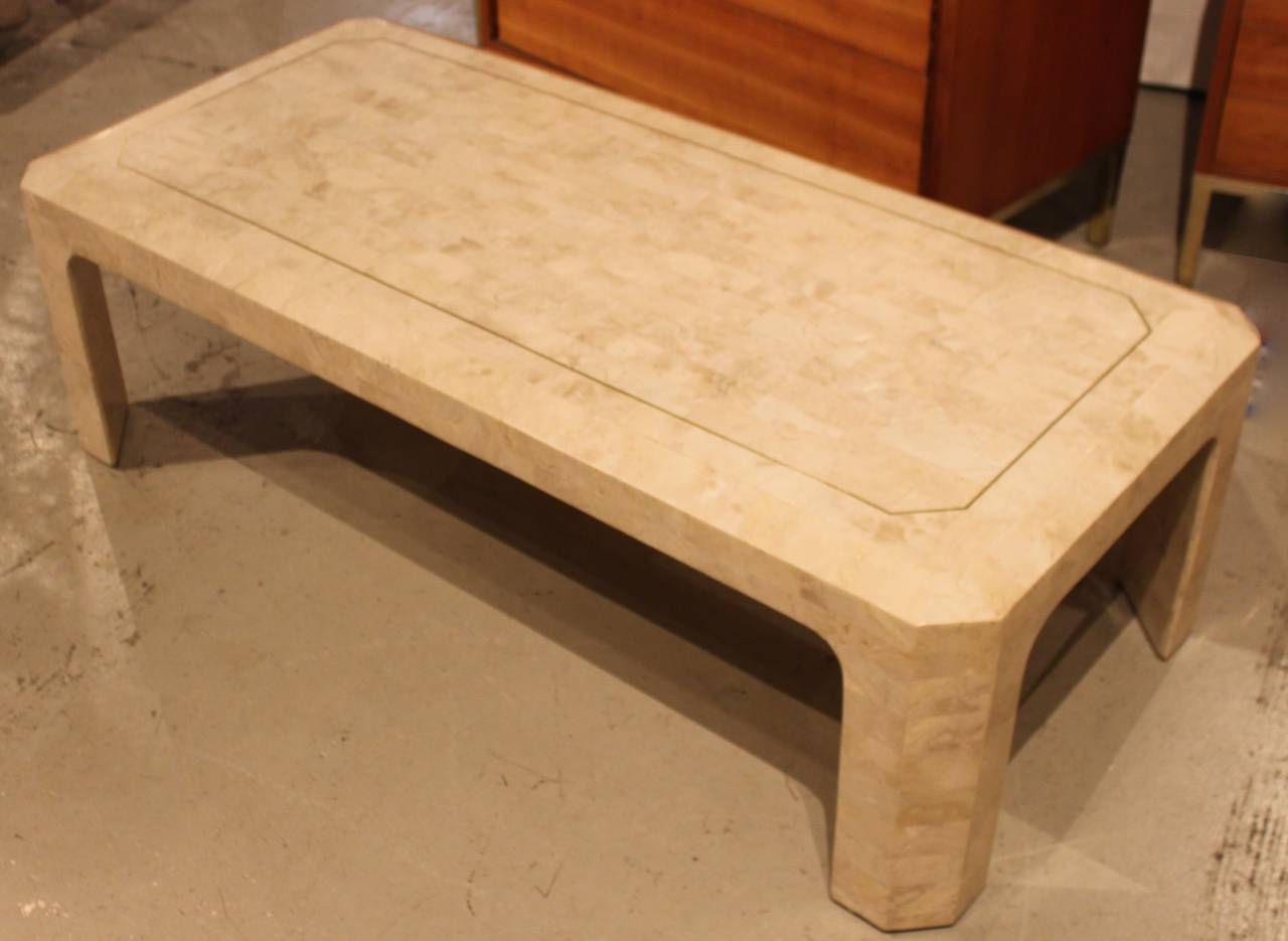 Tessellated fossil stone coffee table by Maitland-Smith.