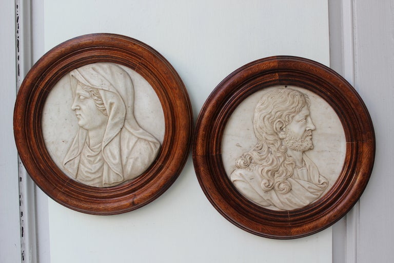18th century Italian school marble medallions of the religious figures, 