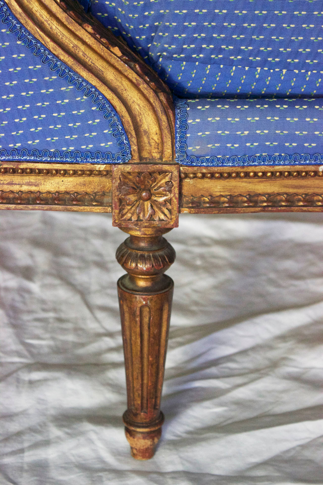 Very handsome duchesse made during Napoleon III period in Louis XVI style. Made of solid beechwood tinted and then gilded, its backrest is in three segments separated by a thin piece of wood and surmounted by a 