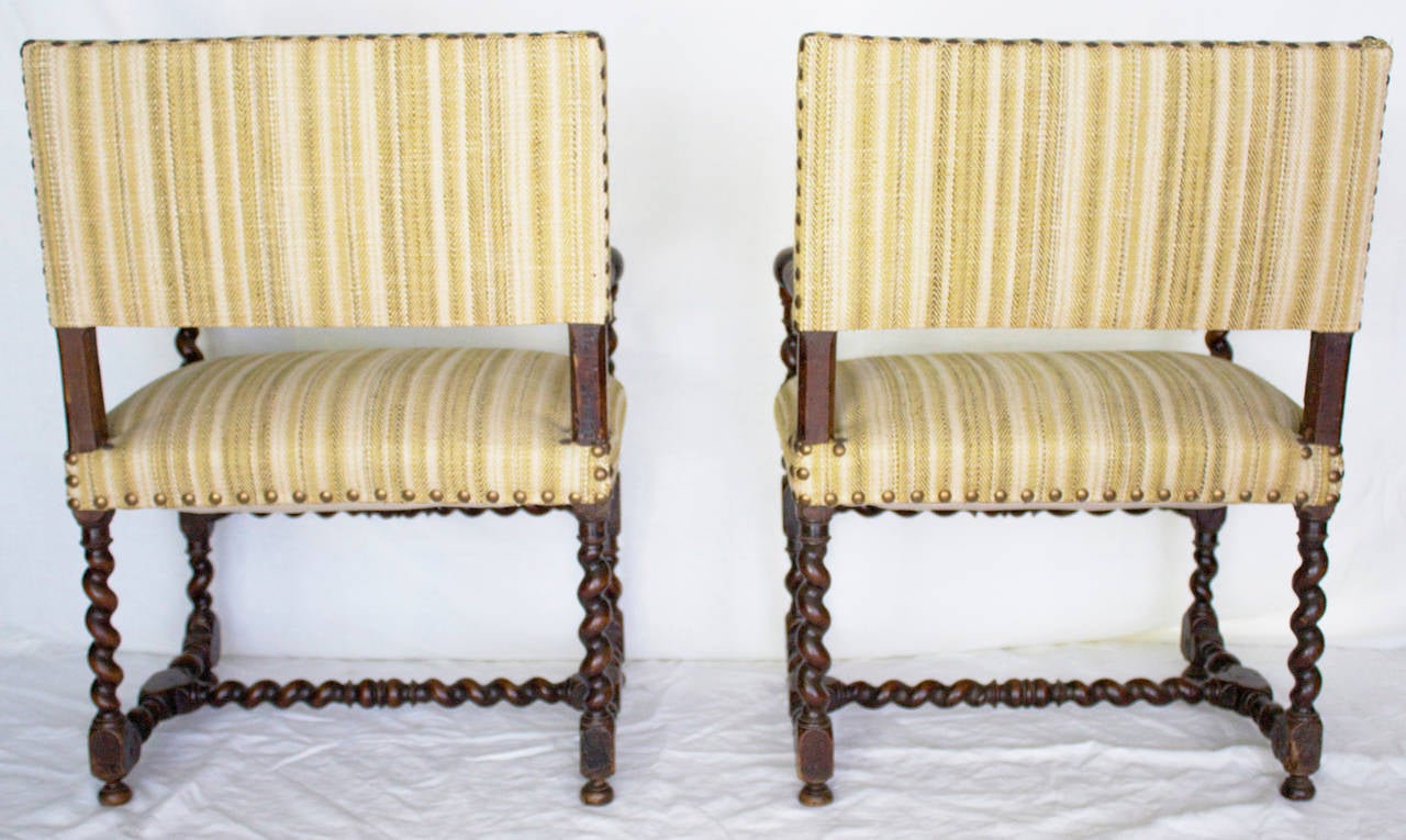 Carved Pair of French Louis XIII Period Armchairs in Walnut