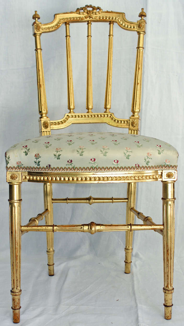 Set of Four Louis XVI Style Gilded Chairs