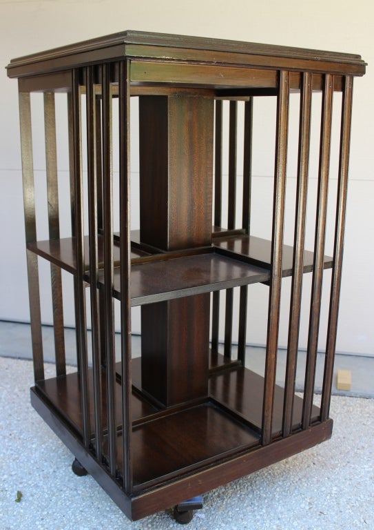 Georgian Style Revolving Bookcase made in France.  Bookcase is made of Mahoghany with satinwood inlay.
France Ca. 1930