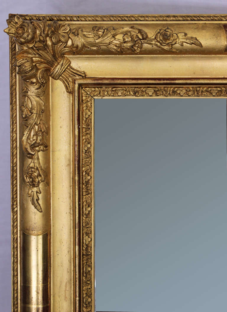 This mirror done during the French restauration period (1815-1830) is doré wood and molded stucco decor of Roses Bouquets and Acanthus Foliages.
Superb quality of 