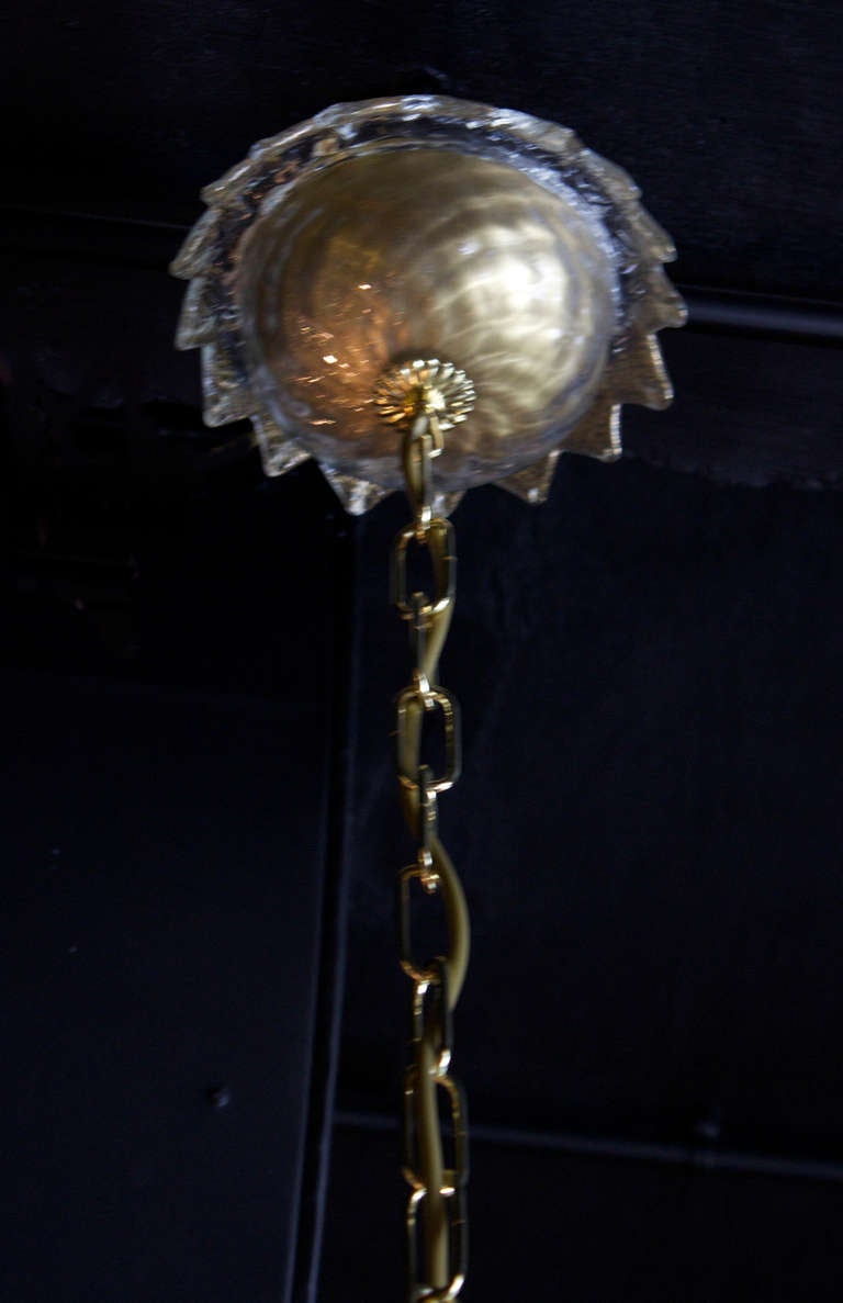 Beautifully composed six light arms chandelier in handblown 