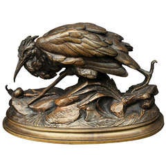 Sculpture en bronze d'un héron et d'un escargot par E. Cana