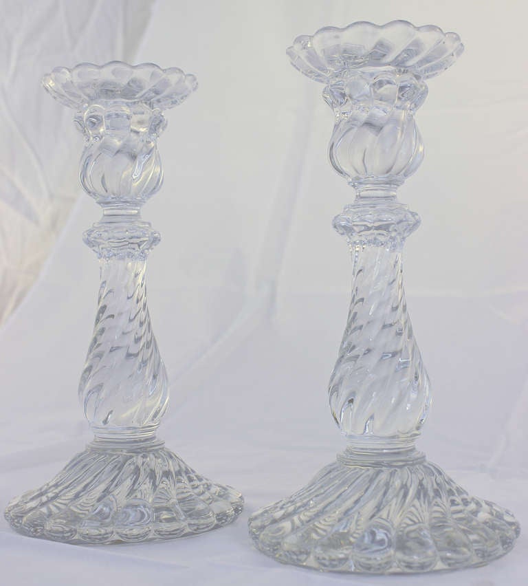 Nice pair of hand molded and hand polished crystal candle holders .Marked Baccarat.