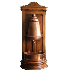 Copper Lavabo on a Walnut support